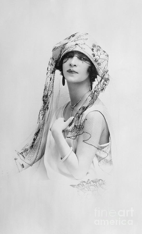 Woman Modeling Hat With Lace Photograph by Bettmann