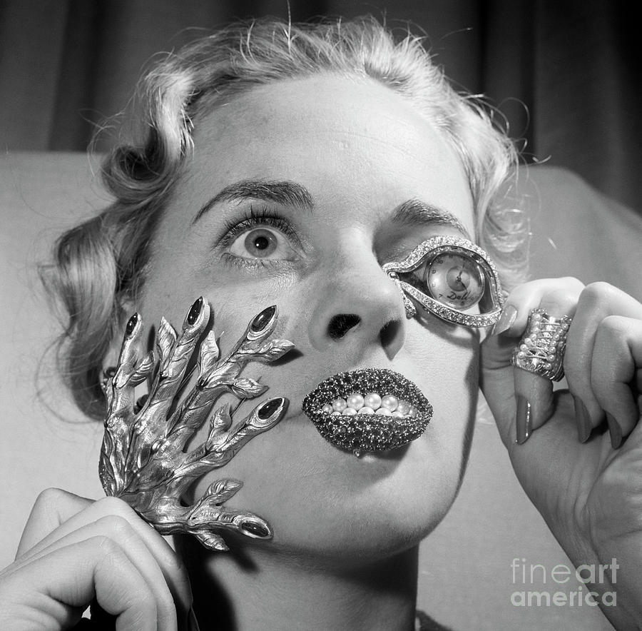 Woman Modelling Strange Jewelry Headsho Photograph by Bettmann
