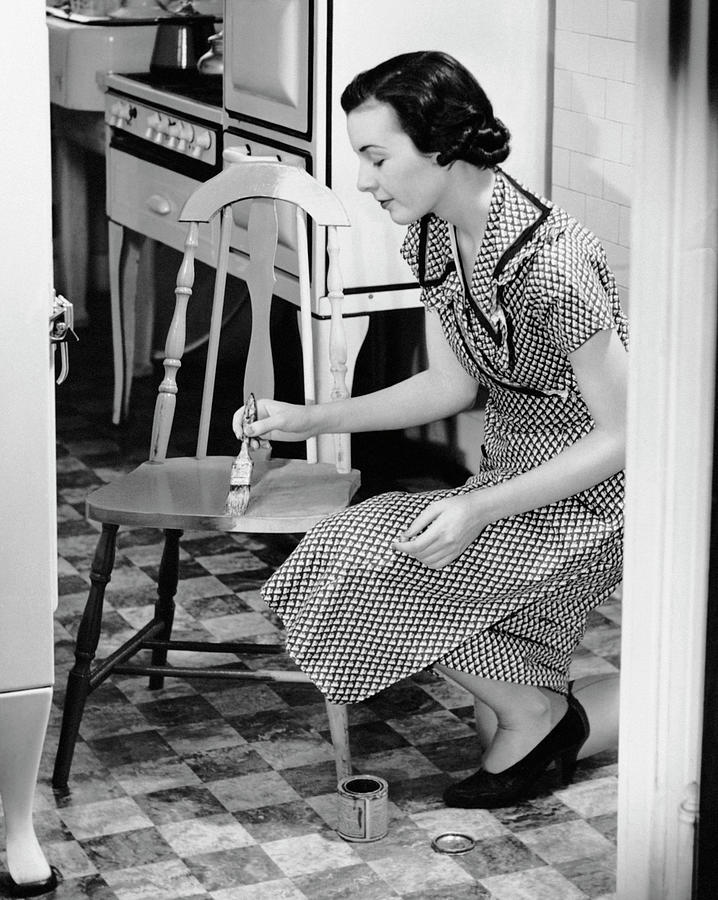 Woman Painting Chair Photograph by George Marks