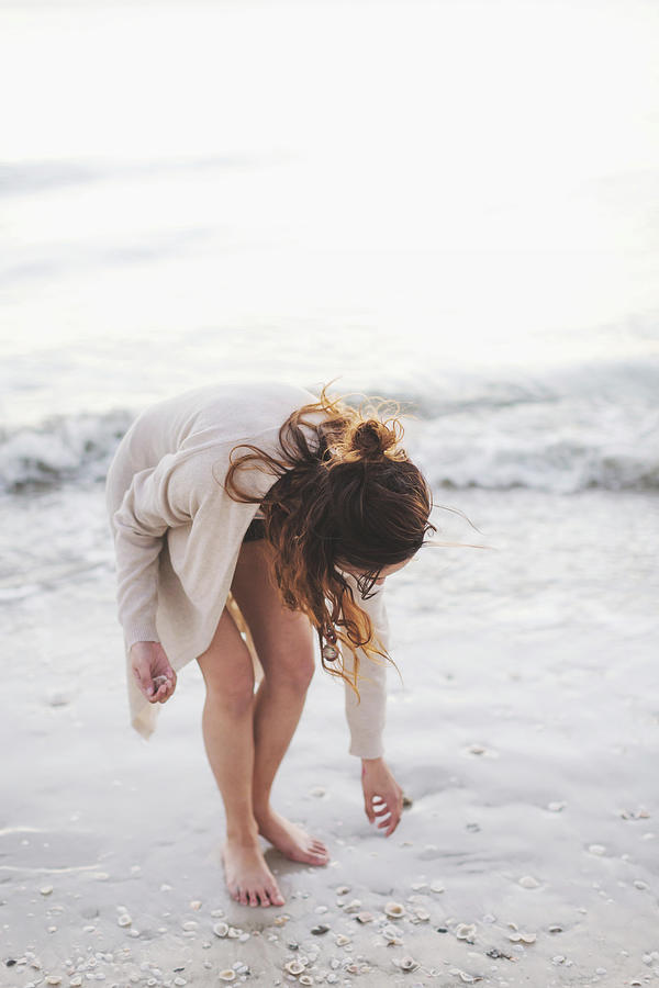 Beach Digital Art - Woman Picking Seashells On Beach by Lena Mirisola