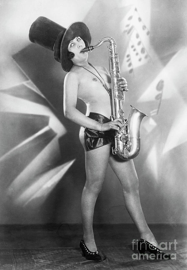 Woman Playing A Saxophone Photograph by Bettmann