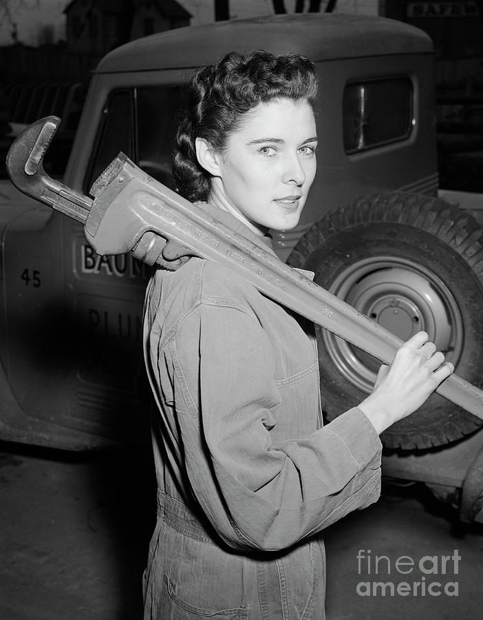 Woman Plumber With Large Wrench Photograph by Bettmann