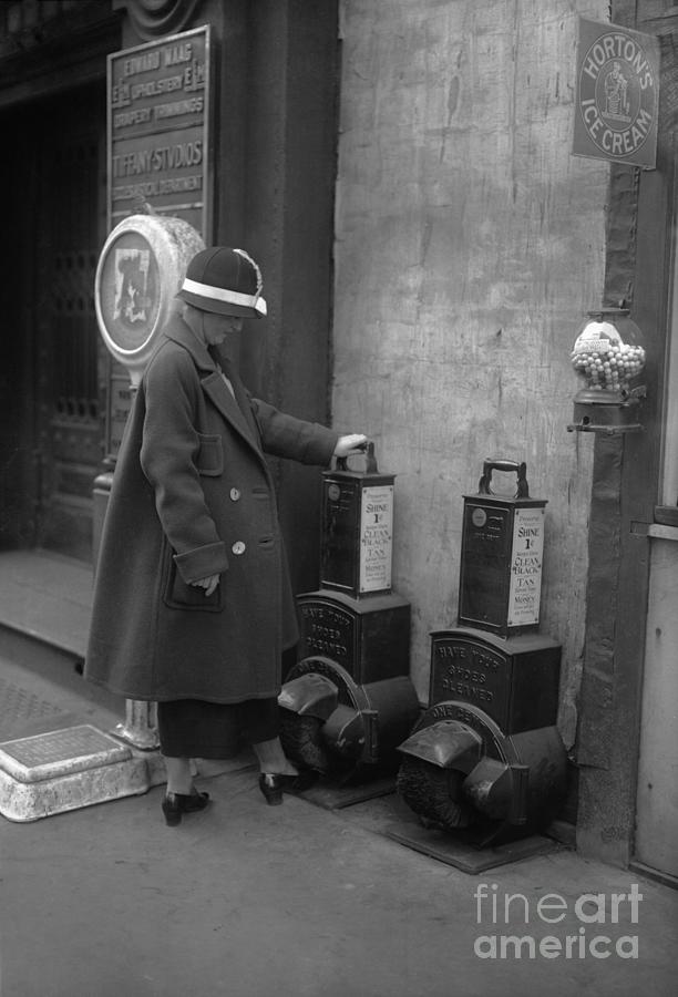 Woman Polishing Shoes On Street Photograph by Bettmann