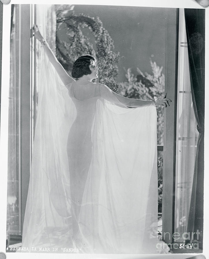 Woman Posing In A Doorway Photograph by Bettmann
