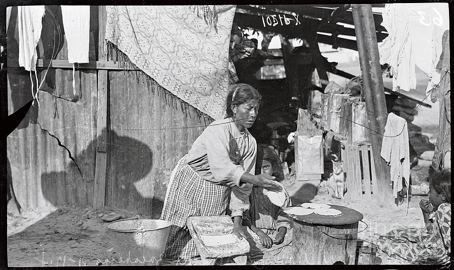 Woman Preparing Meal In Mexican Town Photograph by Bettmann