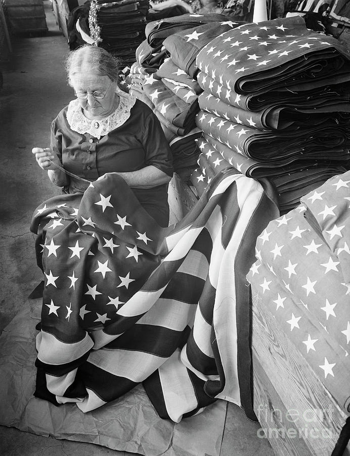 Woman Sewing Stars On Custom Flag Photograph by Bettmann