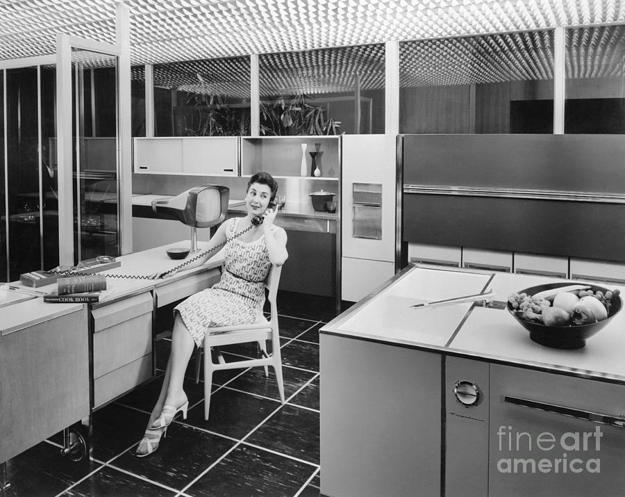 Woman Sitting In Kitchen Photograph by Bettmann Woman Sitting In Kitchen Photograph by Bettmann