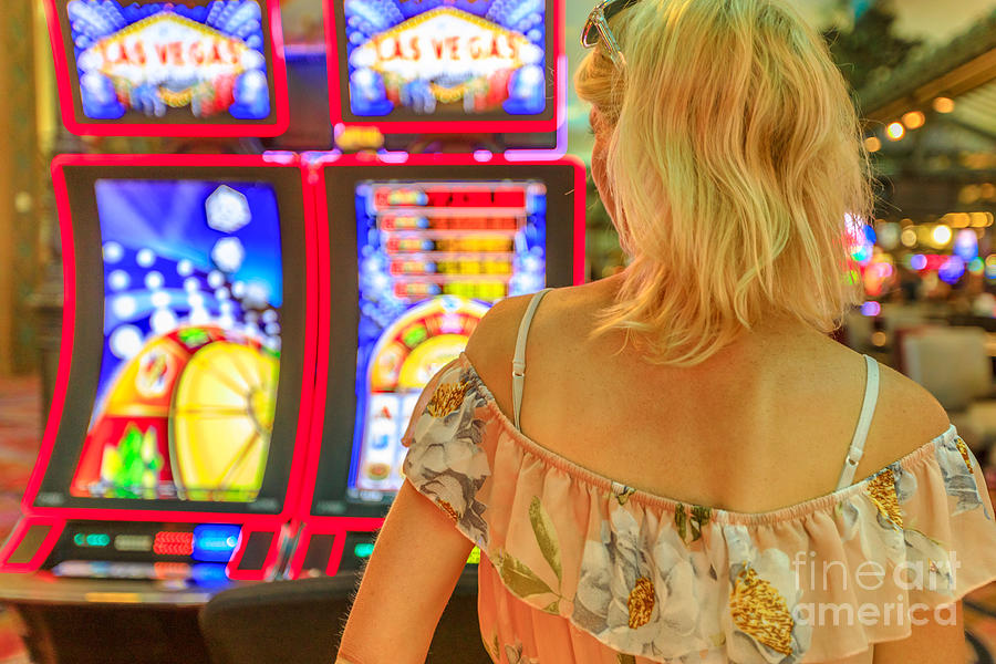 Woman slot machines Photograph by Benny Marty
