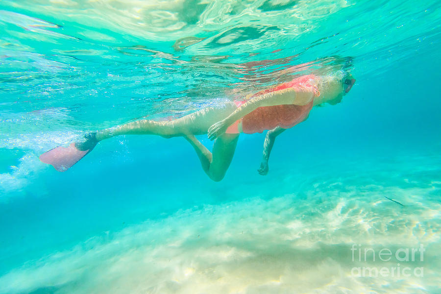 Woman snorkeling WA Photograph by Benny Marty