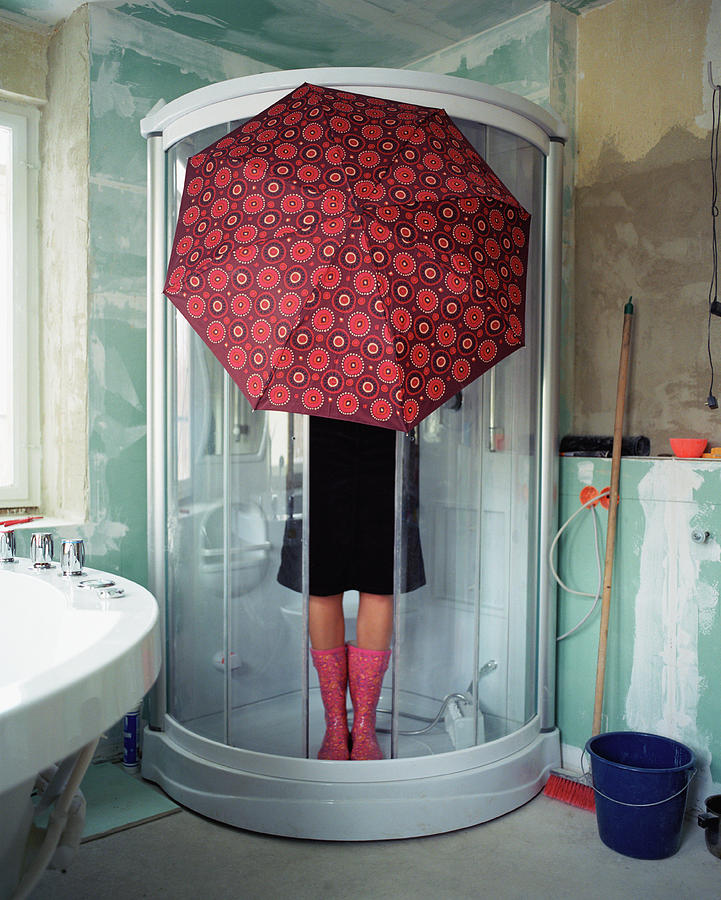 Woman Standing Under Umbrella In Shower Photograph by Silvia Otte