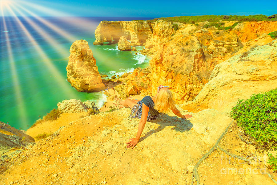 Woman sunbathing in Algarve Photograph by Benny Marty