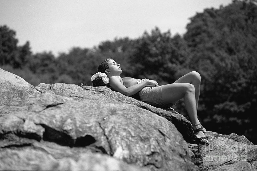 Woman Sunbathing In Central Park Photograph by New York Daily News Archive