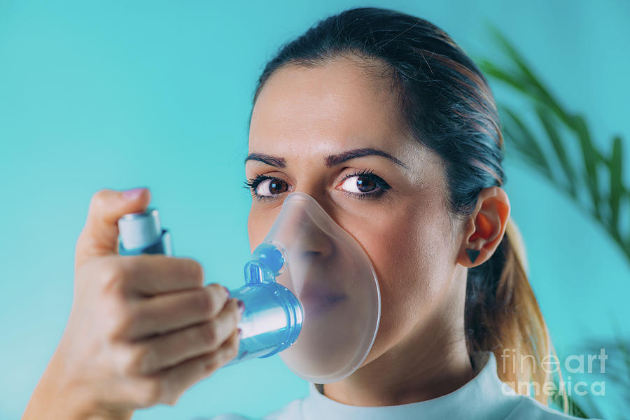 Woman Using Inhaler For Asthma Photograph by Microgen Images/science ...