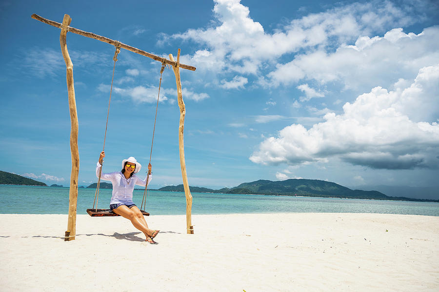 Woman Using Swing At A Visit To Tropical The Island Of Koh Madsum ...