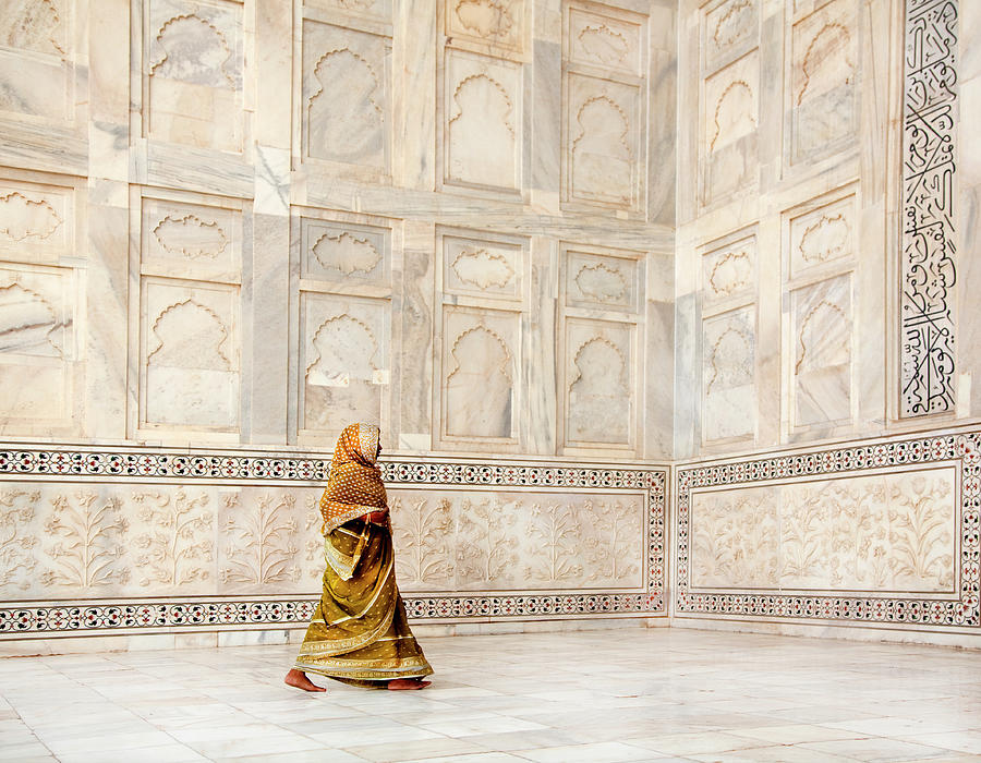 Woman Walking Near Monument Photograph by Grant Faint