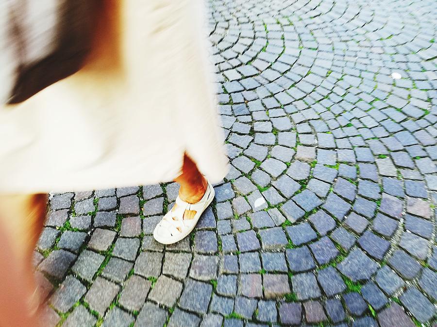 Woman Walking On Footpath Photograph by HelenaP Art