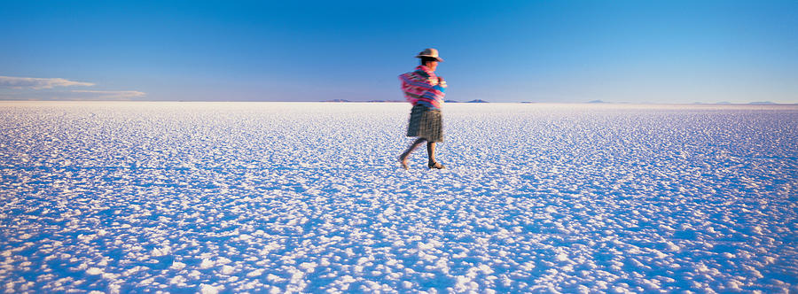 Bolivia Photograph - Woman Walking On Salt Pan, Salar De by Peter Adams