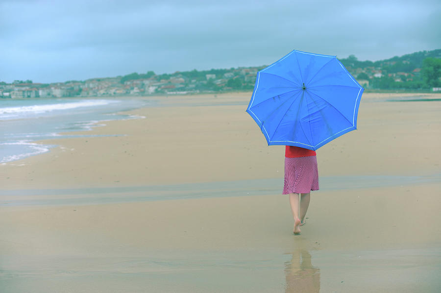 Woman With An Umbrella On The Beach Photograph by Rafa Llano Instantaneas