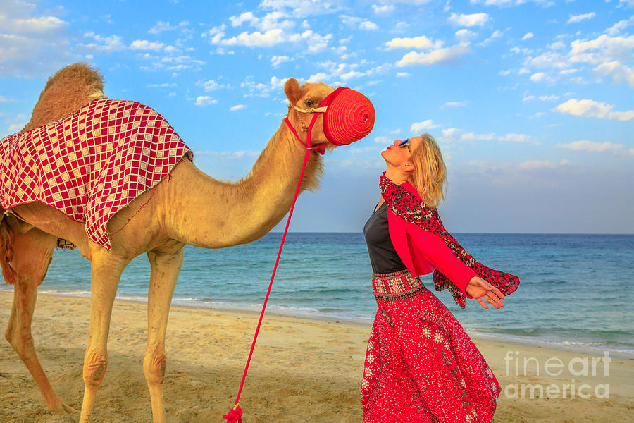 Woman with camel Photograph by Benny Marty
