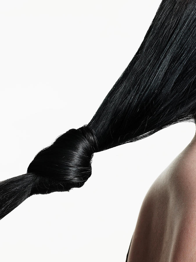 Woman With Hair Tied In Knot, Close-up Photograph by Christopher Robbins