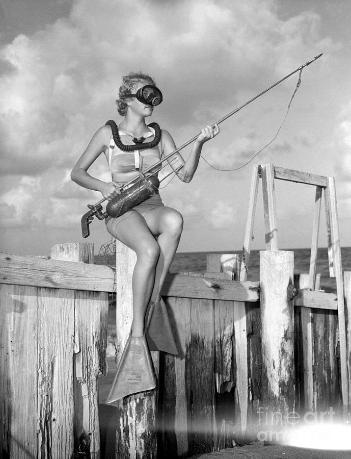 Woman With Scuba Gear And Spear Photograph by Bettmann