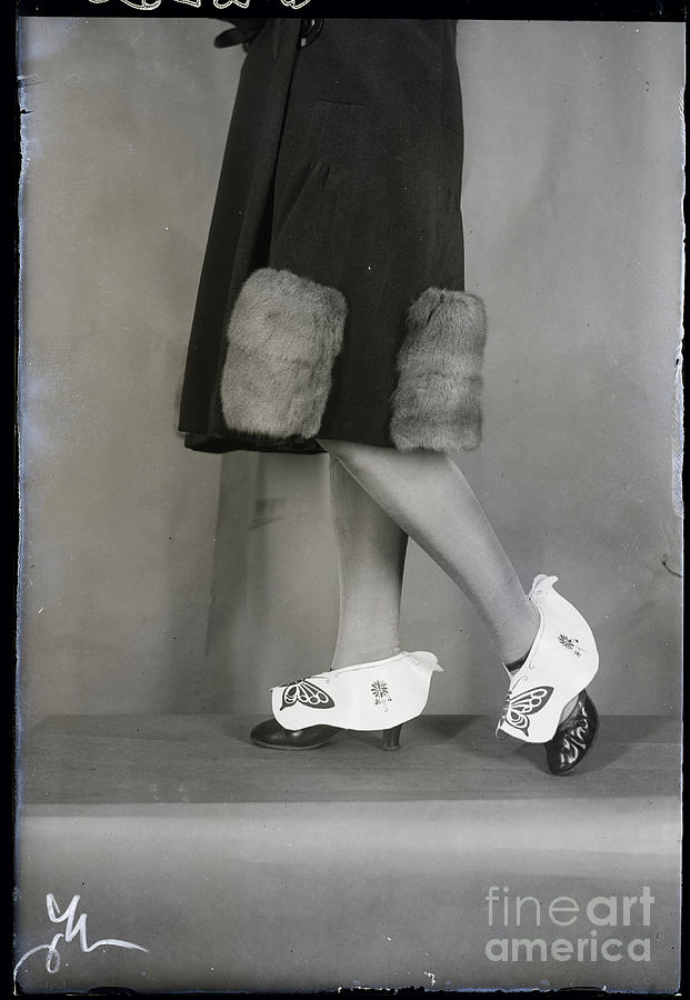 Woman With Shoe-mud-guards Photograph by Bettmann