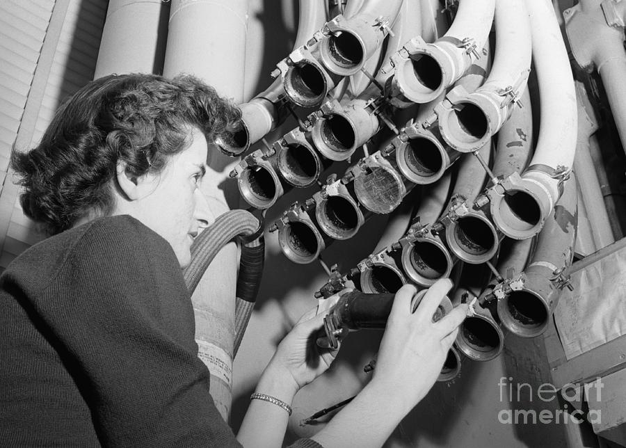 Woman With Stock Tube Photograph by Bettmann
