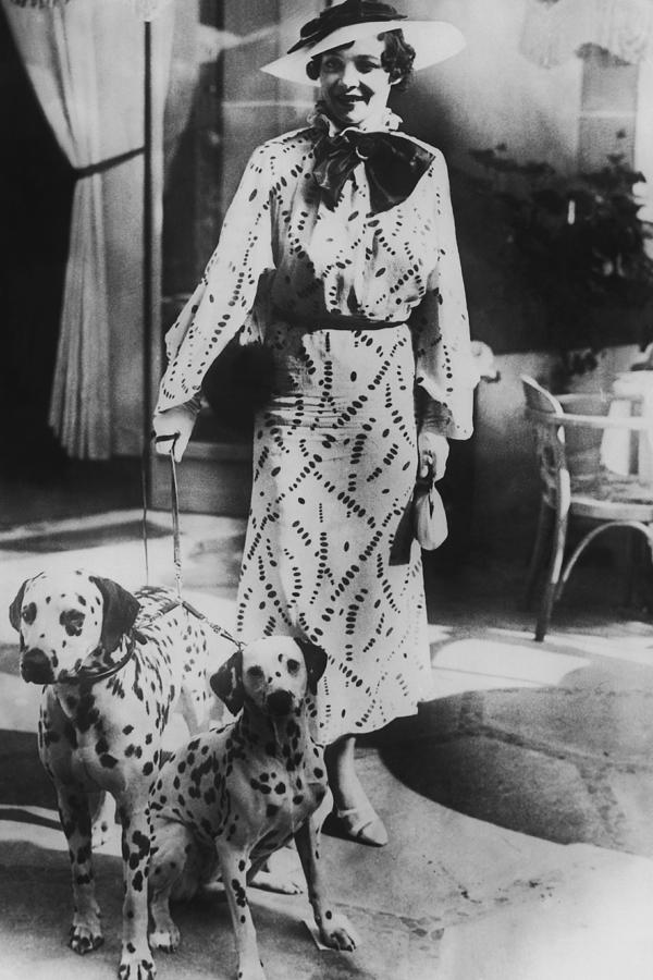 Woman With Two Dalmatians Wearing Photograph by Fpg