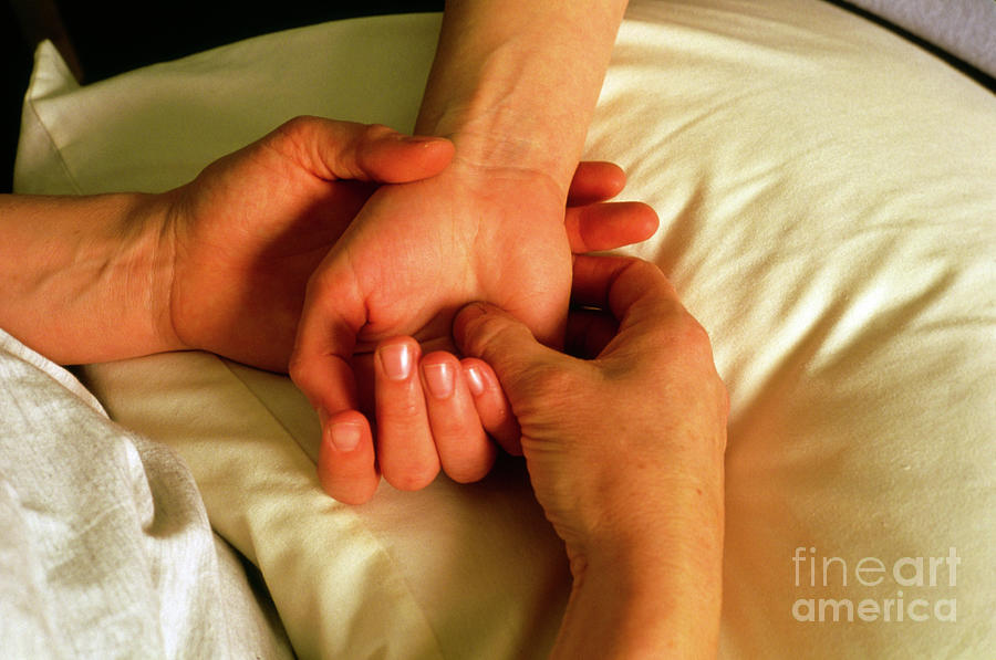 Womans Hand And Wrist Receiving Massage Photograph by Faye Norman/science Photo Library