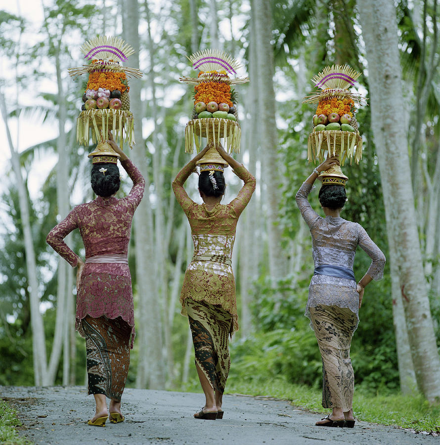 Women Carrying Temple Offerings Photograph by Martin Puddy
