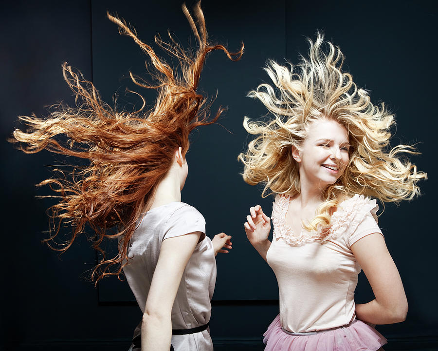 Women Dancing Hair Blowing In Wind Photograph by Betsie Van Der Meer