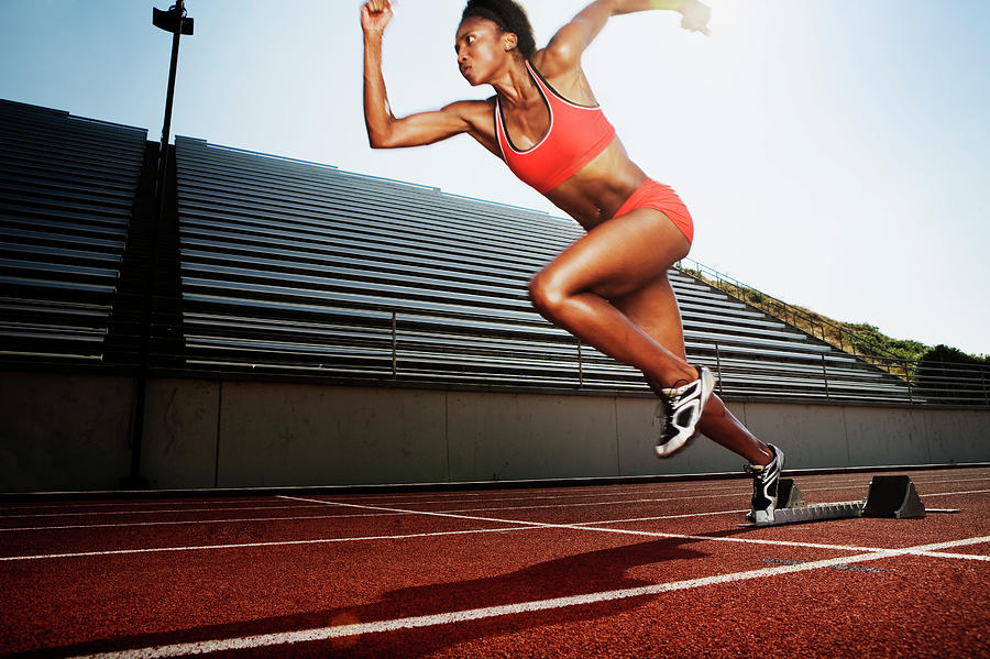 https://images.fineartamerica.com/images/artworkimages/mediumlarge/2/women-running-on-athletic-track-jupiterimages.jpg