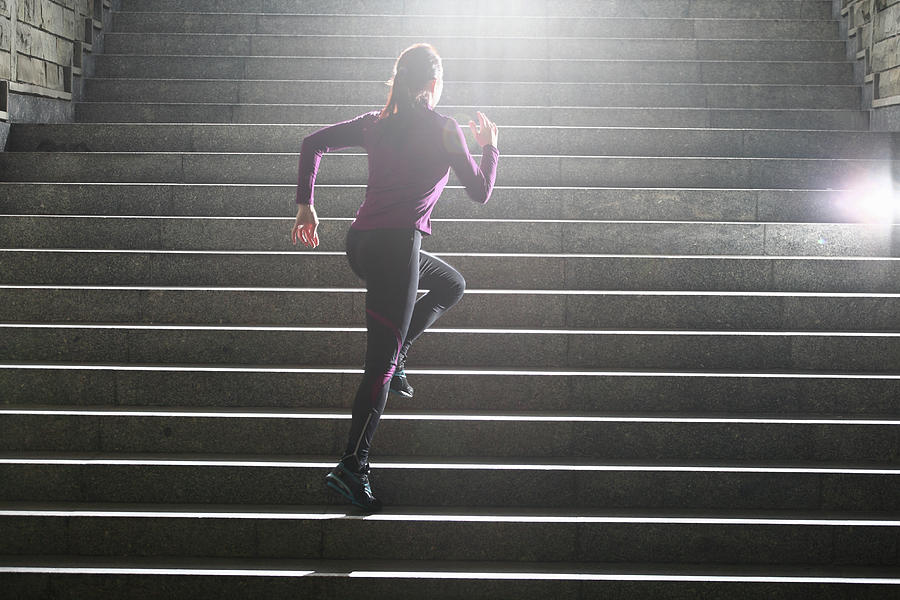Women Running On Stairs Photograph by Stanislaw Pytel