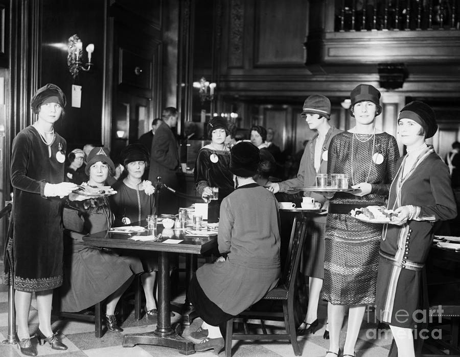 Women Serving Food At Restaurant Photograph by Bettmann