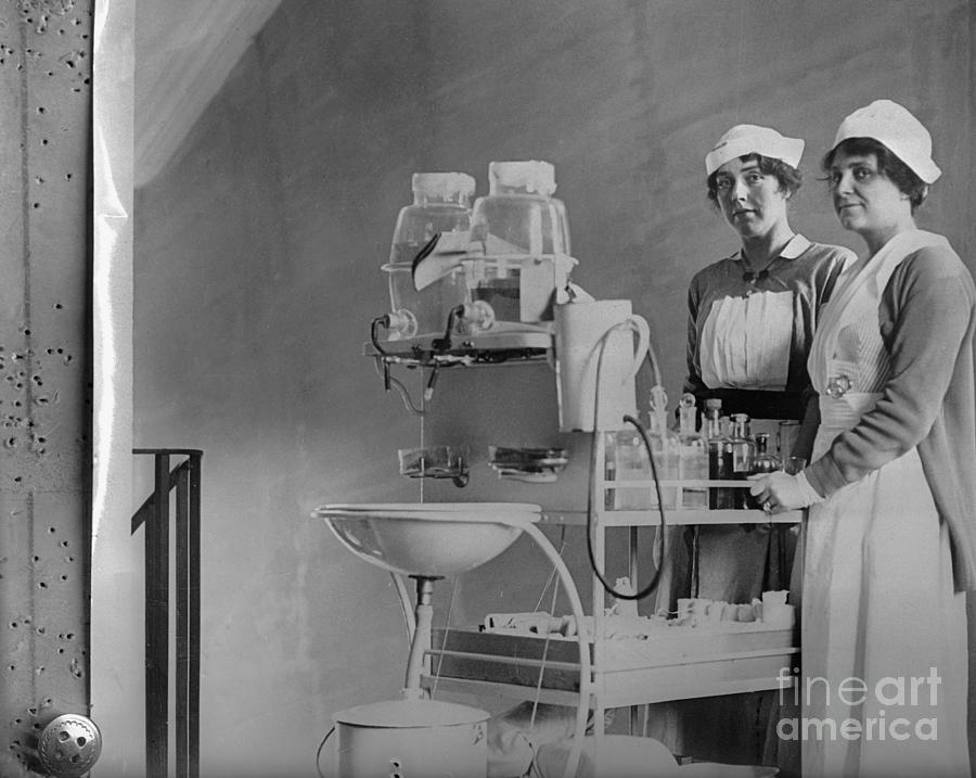 Women Standing Near Hospital Equipment Photograph by Bettmann