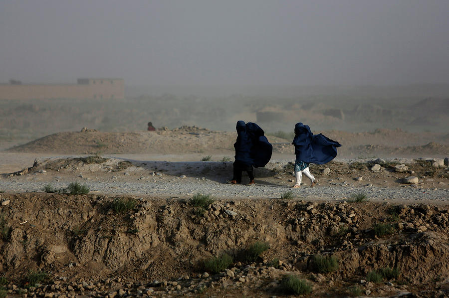 Women Walk on a Windy Day Outside Kabul Photograph by Mohammad Ismail ...