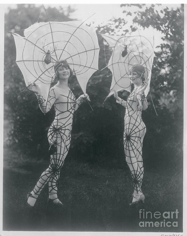 Women Wearing Spider Costumes Photograph by Bettmann