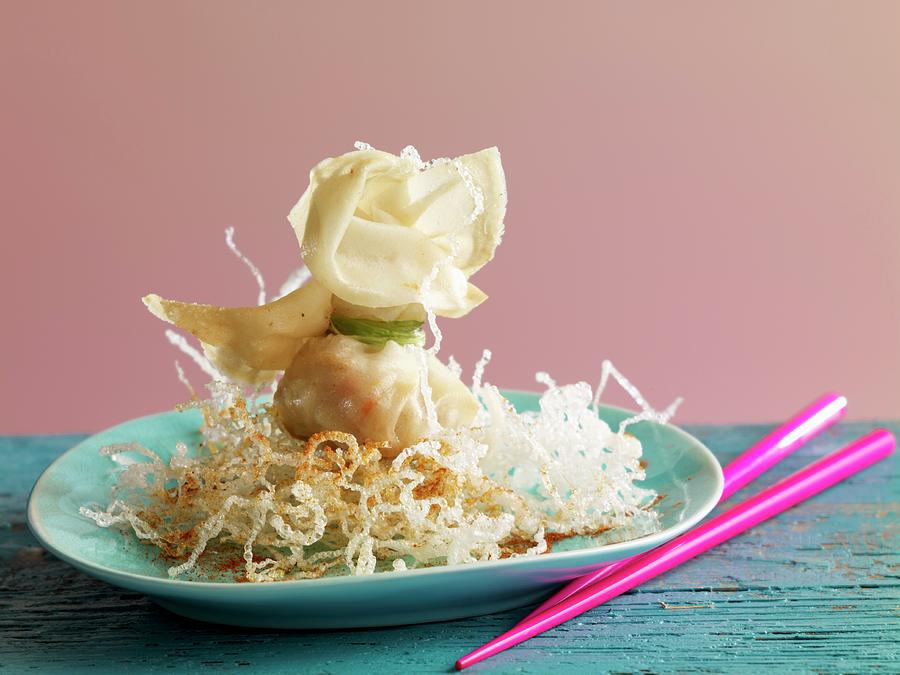 Wonton Filled With Shrimp On A Bed Of Fried Rice Noodles Photograph by Studio R. Schmitz