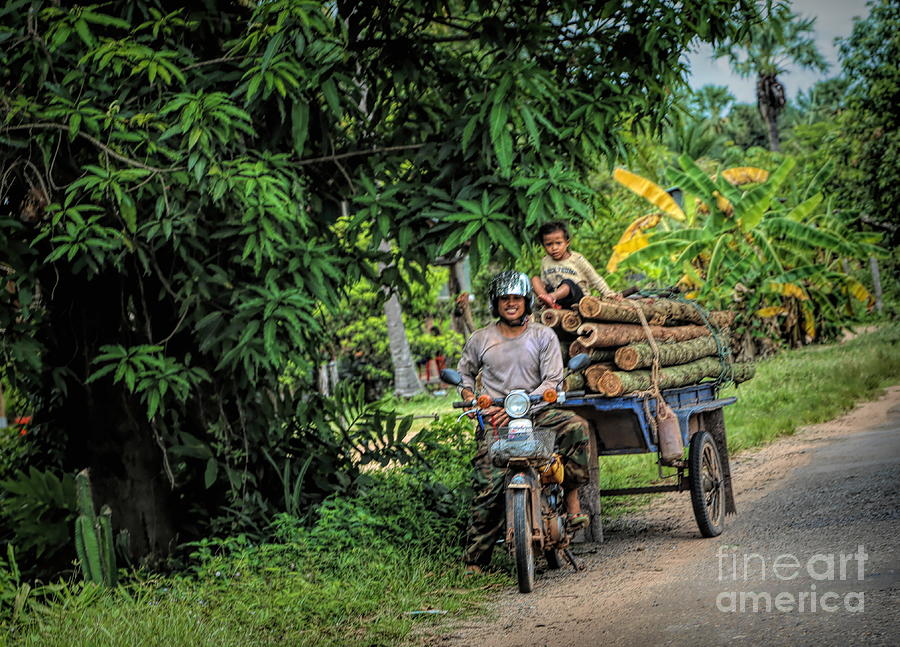 Wood Transport Cambodian Man and Child  Photograph by Chuck Kuhn