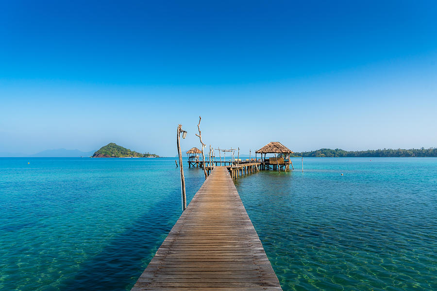 Summer Photograph - Wooden Bar In Sea And Hut With Clear by Prasit Rodphan