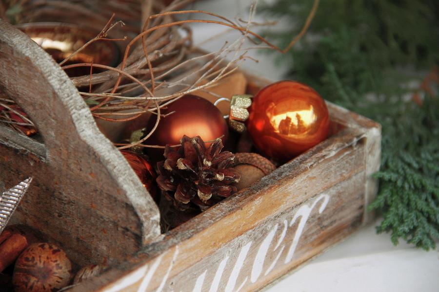 Wooden Crate With Pine Cones And Christmas Tree Baubles Photograph by Barbara Ellger