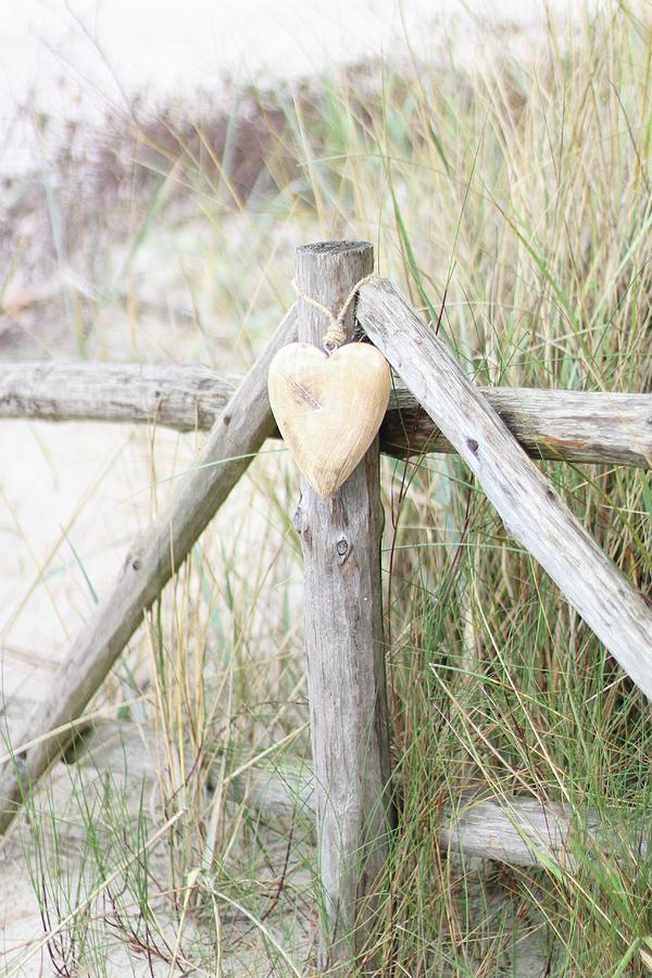 Wooden Heart Hanging On Fence On Beach Photograph by Sylvia E.k Photography