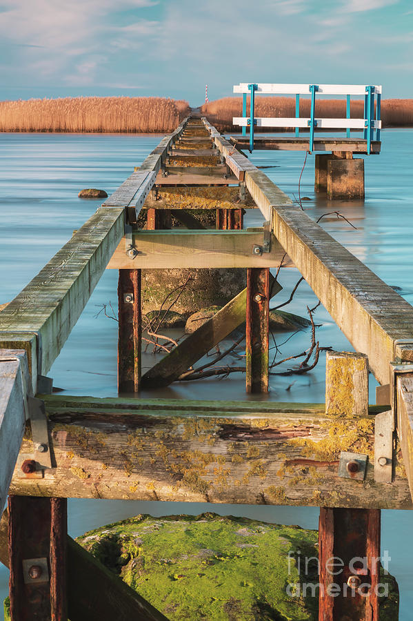 Wooden jetty to island Photograph by Sophie McAulay