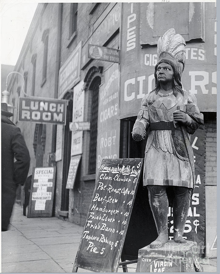 Wooden Native Am Statue In Front Photograph by Bettmann Wooden Native Am Statue In Front Photograph by Bettmann