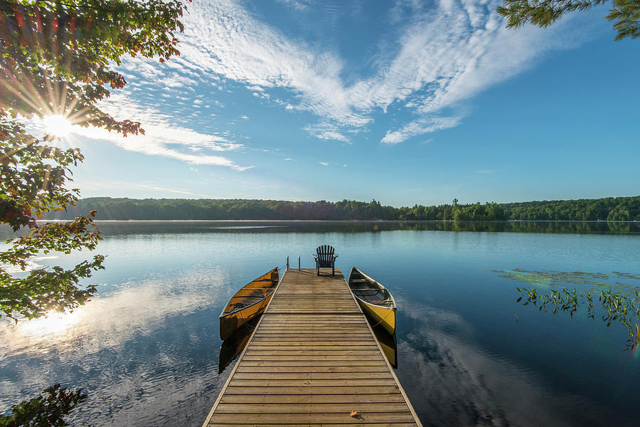 Wooden Pier Reaches Into Tranquil Lake Photograph by Ascent Xmedia