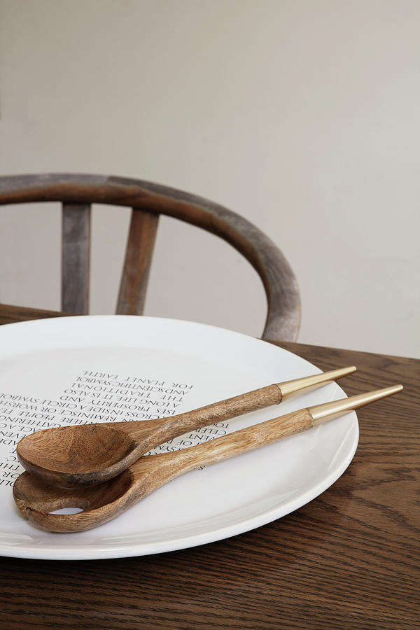 Wooden Salad Servers On Plate Photograph by Great Stock!