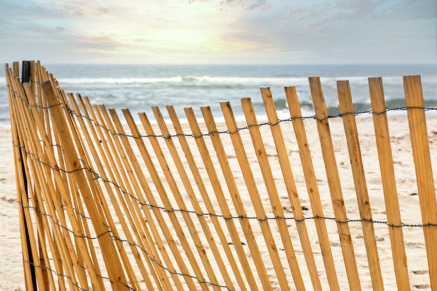 Wooden Slat Fence On Beach by Claudia Uripos