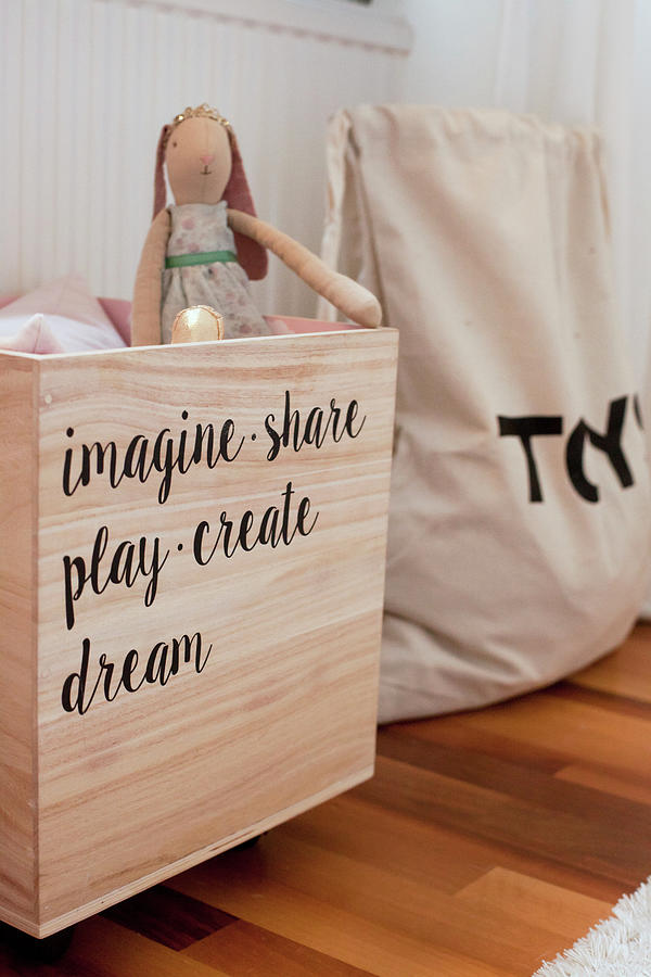 Wooden Toy Chest With Motto Made From Stickers Photograph by Camilla Isaksson