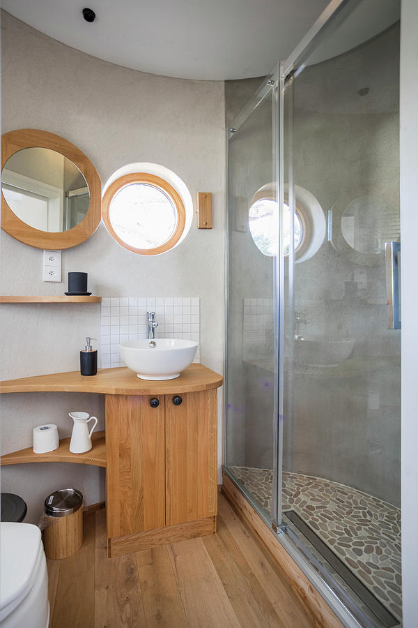 Wooden Washstand And Glass Shower Doors In Bathroom In Round Extension Of Tiny House Photograph by Pia Simon