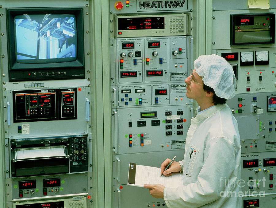 Worker & Control Panel In An Optical Fibre Factory Photograph by Maximilian Stock Ltd/science Photo Library